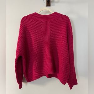 Bright pink sweater